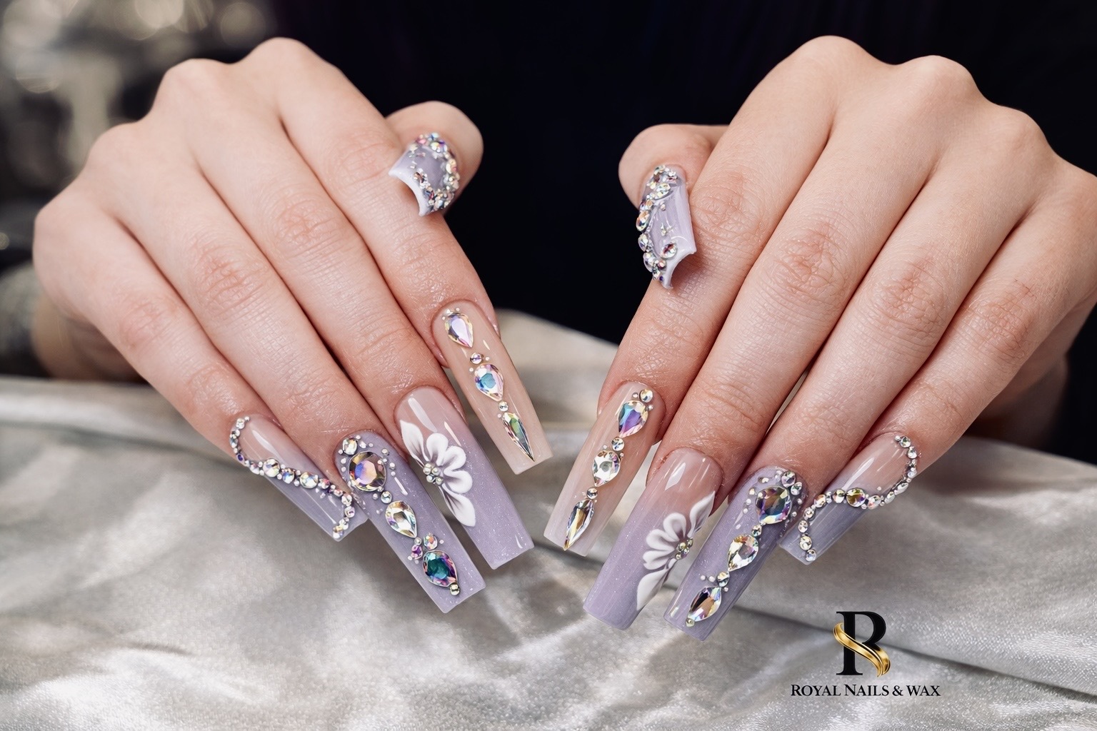 Royal Nails & Wax logo